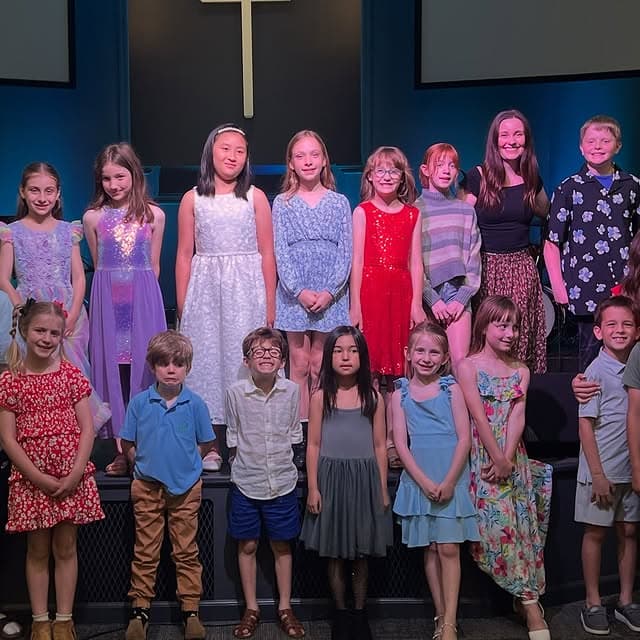 Students and Liv on stage at the May recital